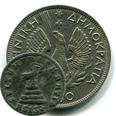 Roman coin of Constans, with Phoenix in a nimbus or halo, standing on a pyre or pile of rocks, and, behind it, a Greek 5 Drachmae coin of the Second Hellenic Republic, with a Phoenix rising from the flame.